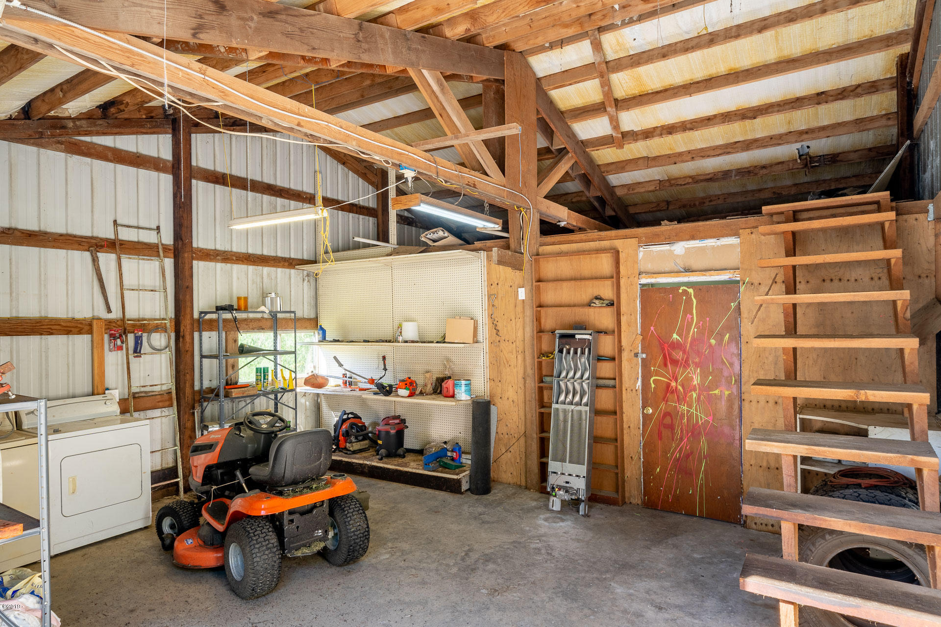 429 Hidden Valley Road Toledo, OR 97391 - Photo 25 of 41 AWESOME SHOP OFF GARAGE AREA