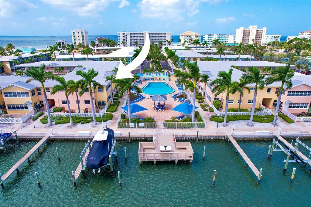 a view of yard with swimming pool and outdoor seating