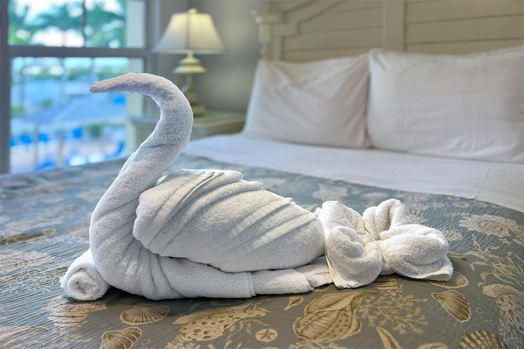 19417 Gulf Boulevard, Unit A202 Indian Shores, FL 33785 - Photo 22 of 35 a view of a couch in wooden floor