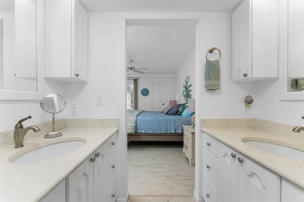 1551 Beach Road, Unit 204 Englewood, FL 34223 - Photo 20 of 55 a bathroom with a sink and a mirror
