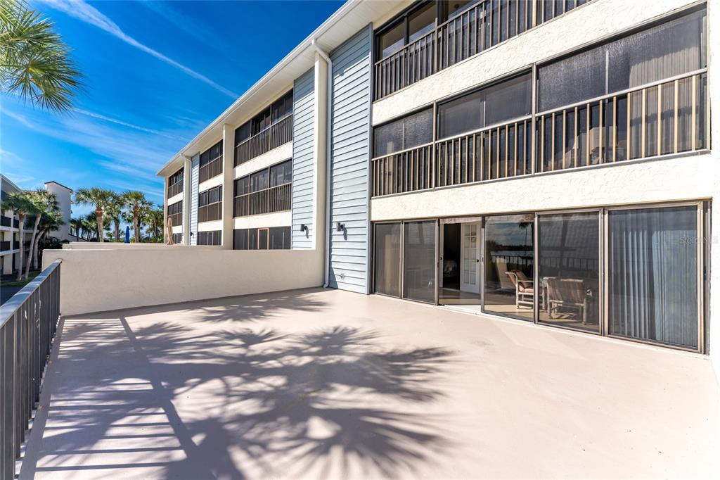 1551 Beach Road, Unit 204 Englewood, FL 34223 - Photo 26 of 55 a view of a house with a outdoor space