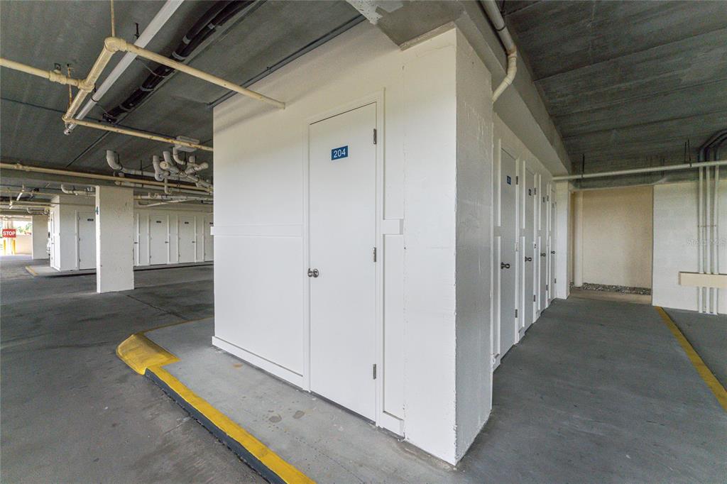 1551 Beach Road, Unit 204 Englewood, FL 34223 - Photo 30 of 55 a view of a hallway with wooden floor