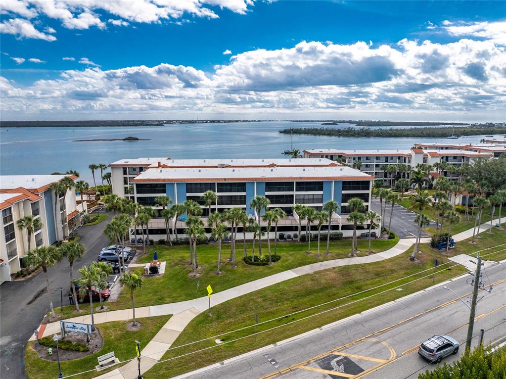 1551 Beach Road, Unit 204 Englewood, FL 34223 - Photo 38 of 55 a view of swimming pool with seating space