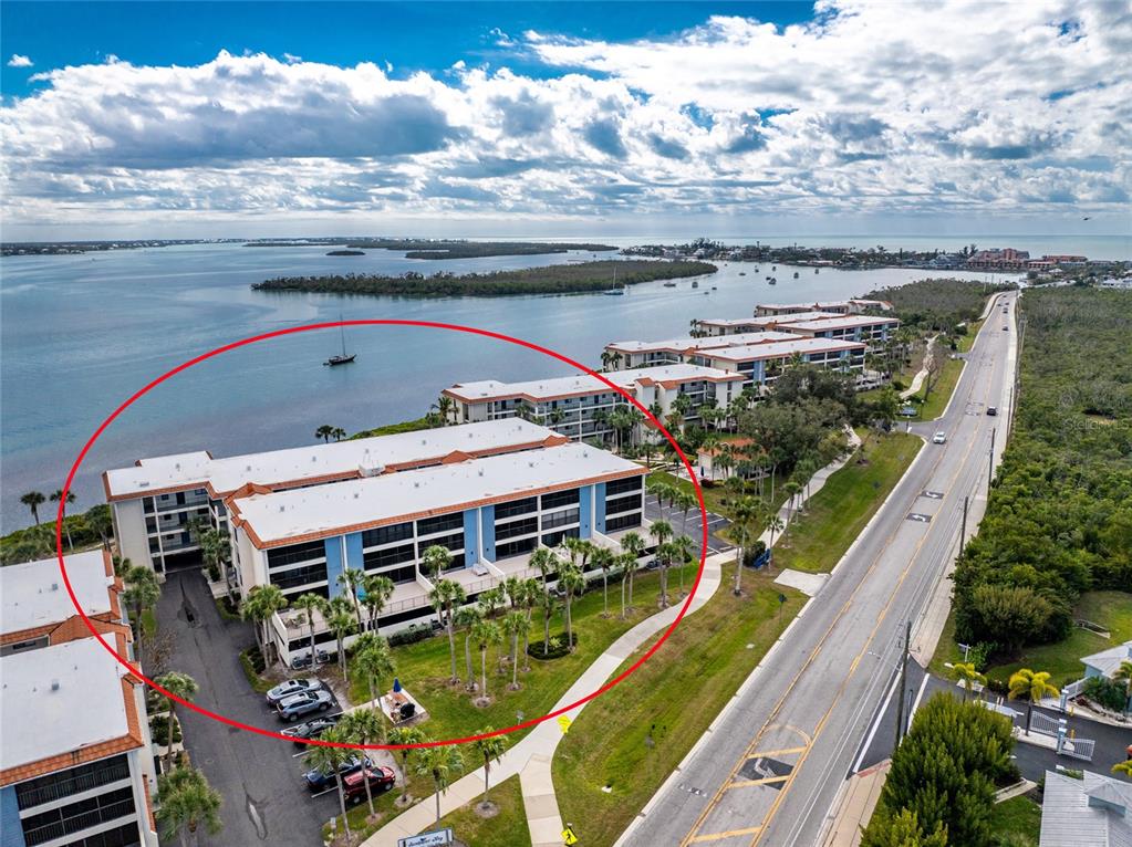 1551 Beach Road, Unit 204 Englewood, FL 34223 - Photo 39 of 55 a view of a balcony with two chairs