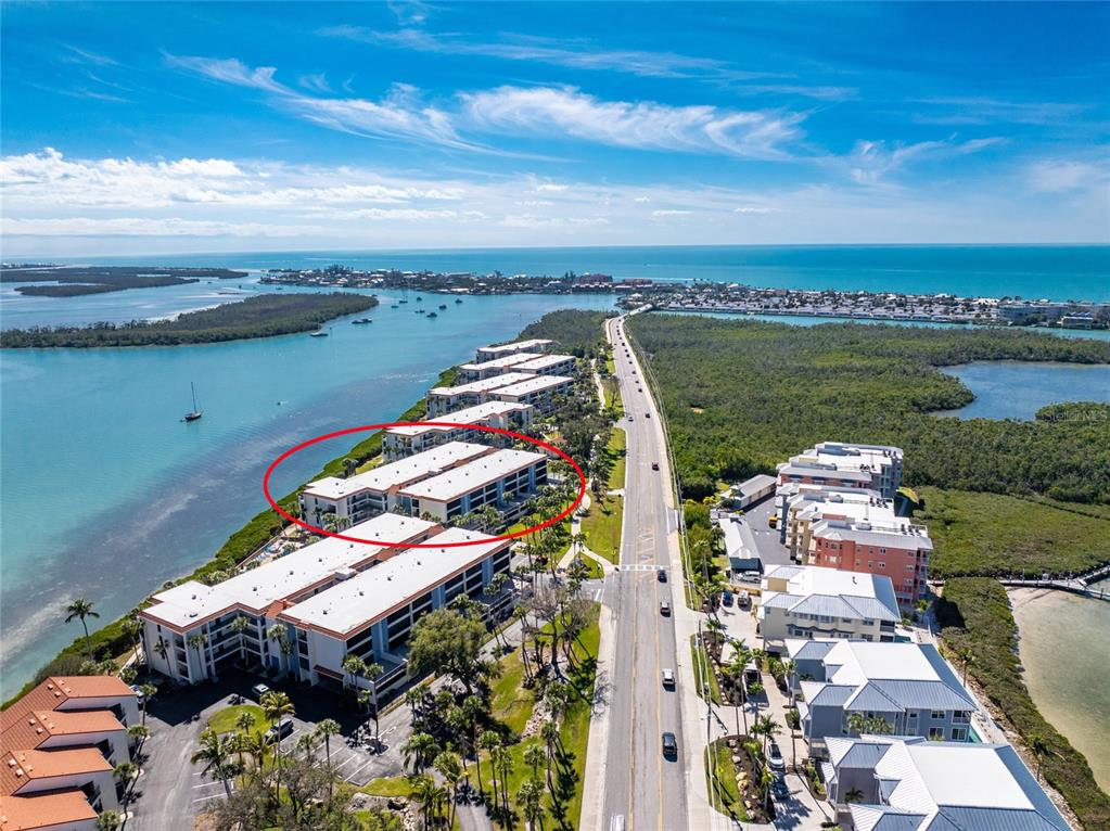1551 Beach Road, Unit 204 Englewood, FL 34223 - Photo 42 of 55 a view of a lake with a city view