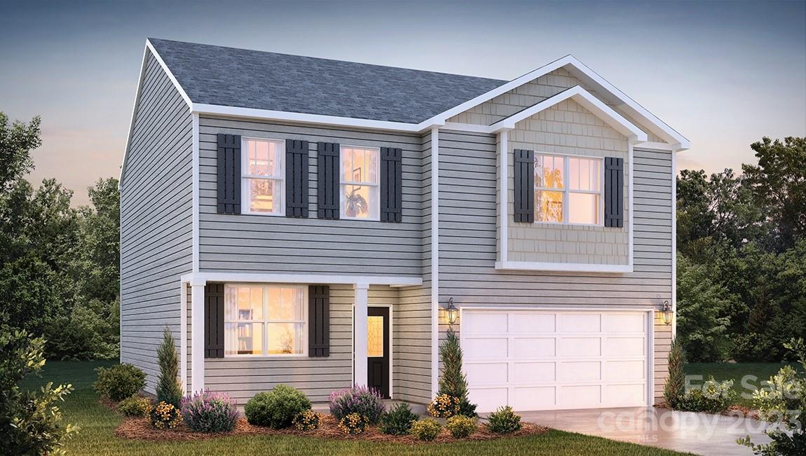 111 Wheatfield Road Fletcher, NC 28732 - Photo 1 of 36 a front view of a house with a yard