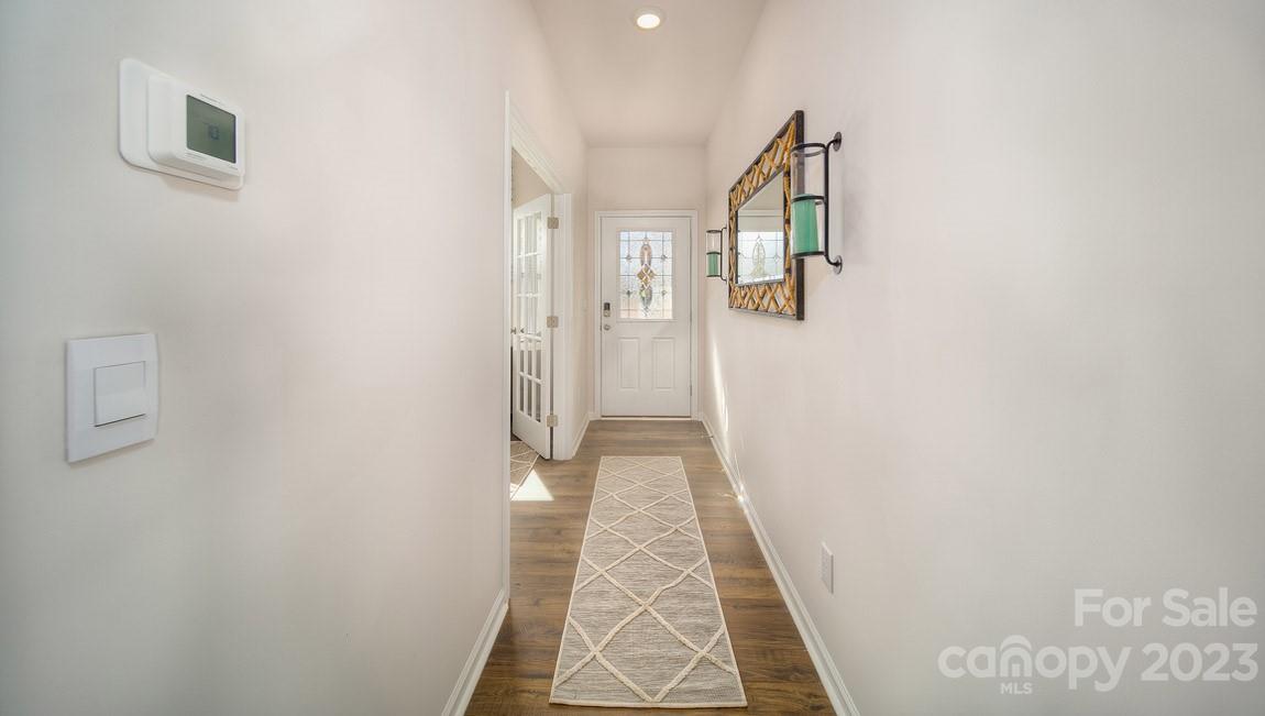 111 Wheatfield Road Fletcher, NC 28732 - Photo 2 of 36 a view of a hallway with wooden floor and entryway