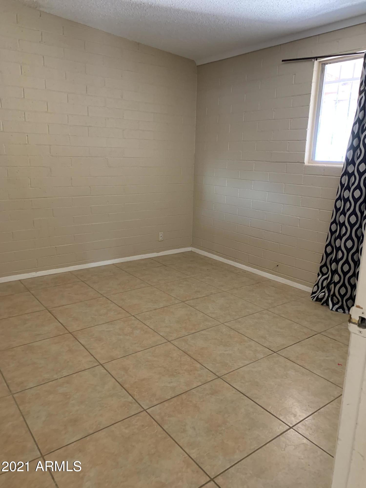 3758 West Romley Road Phoenix, AZ 85041 - Photo 4 of 13 IMG-3503