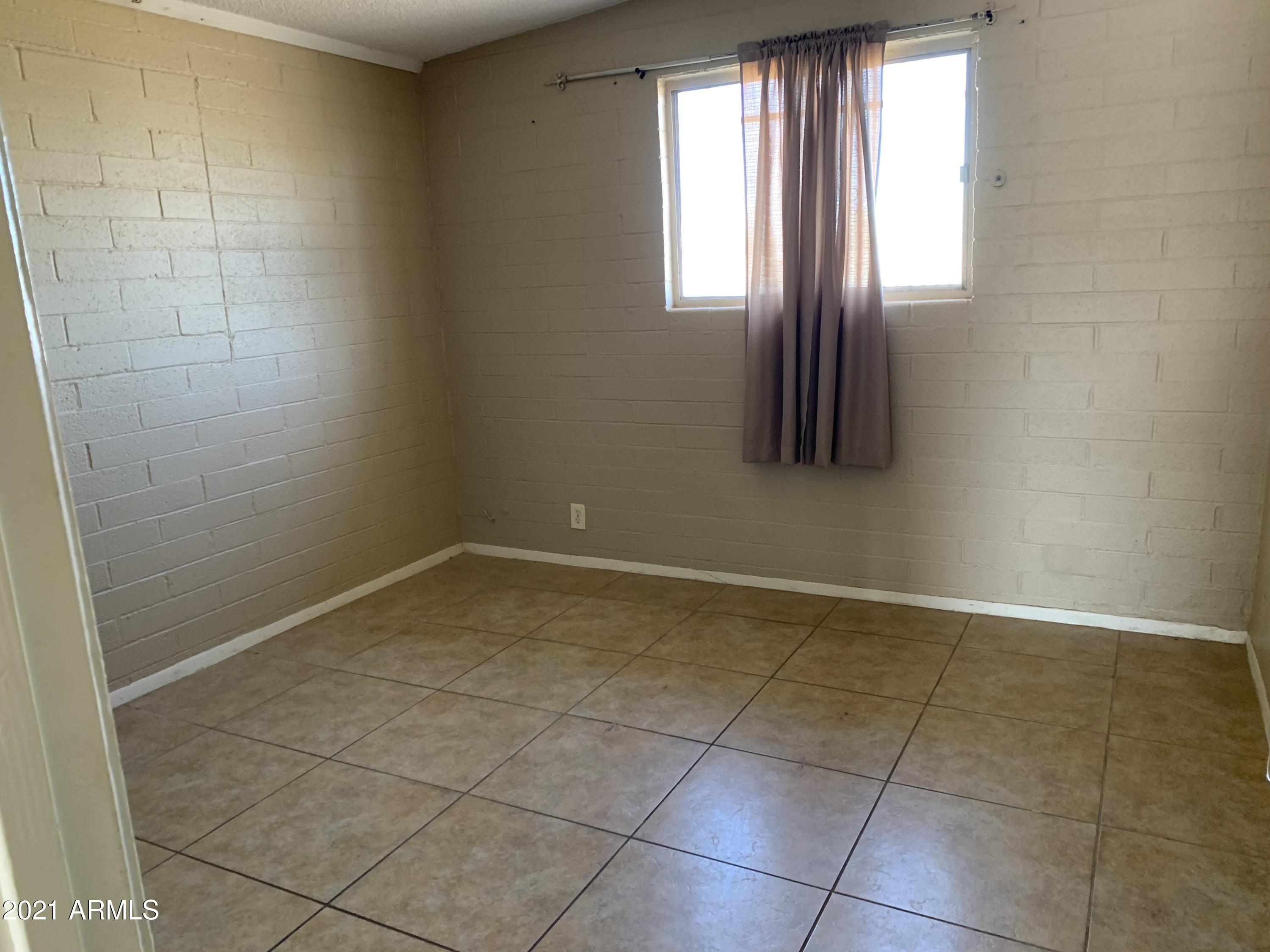 3758 West Romley Road Phoenix, AZ 85041 - Photo 5 of 13 IMG-3504