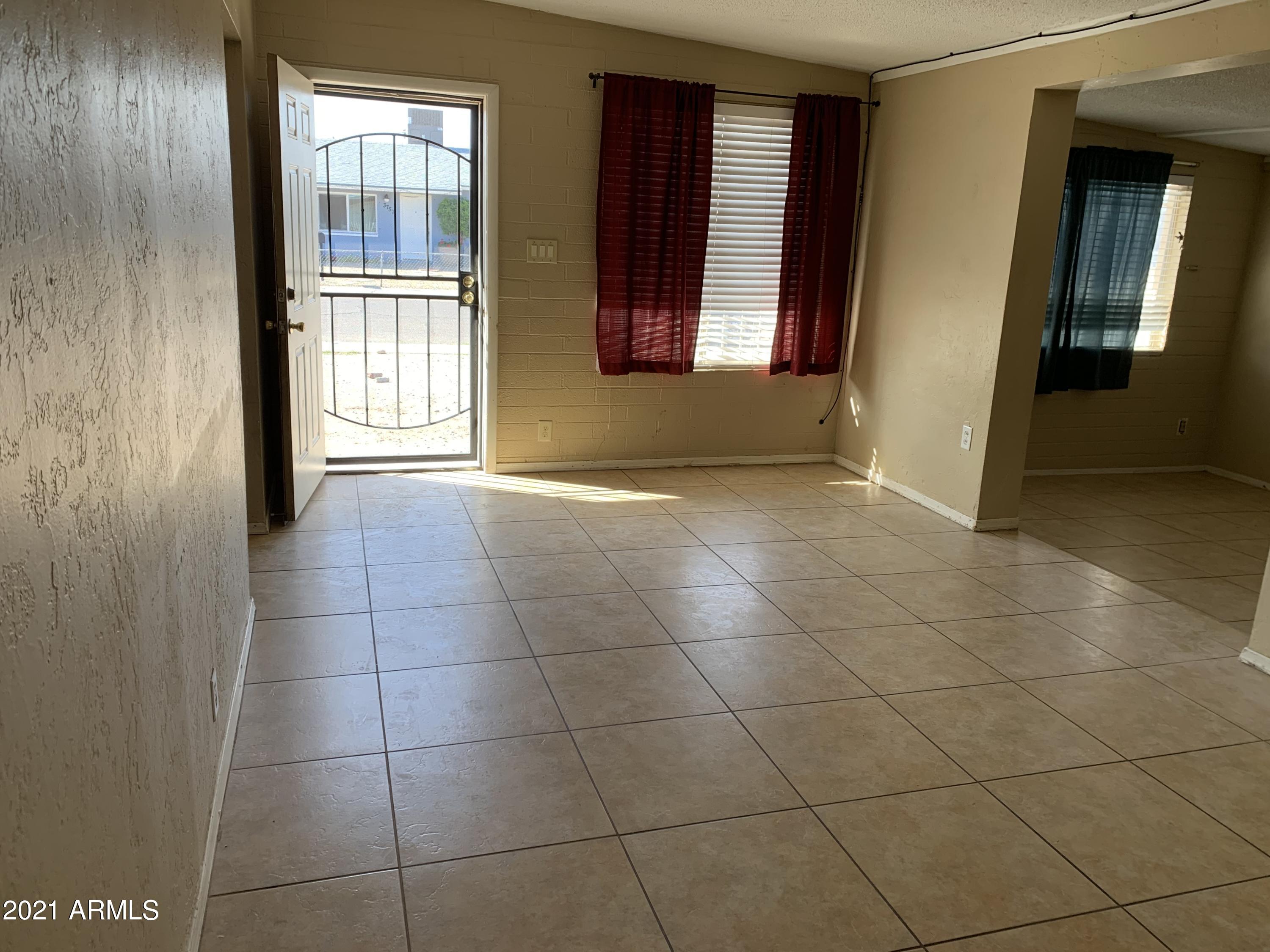 3758 West Romley Road Phoenix, AZ 85041 - Photo 6 of 13 IMG-3505
