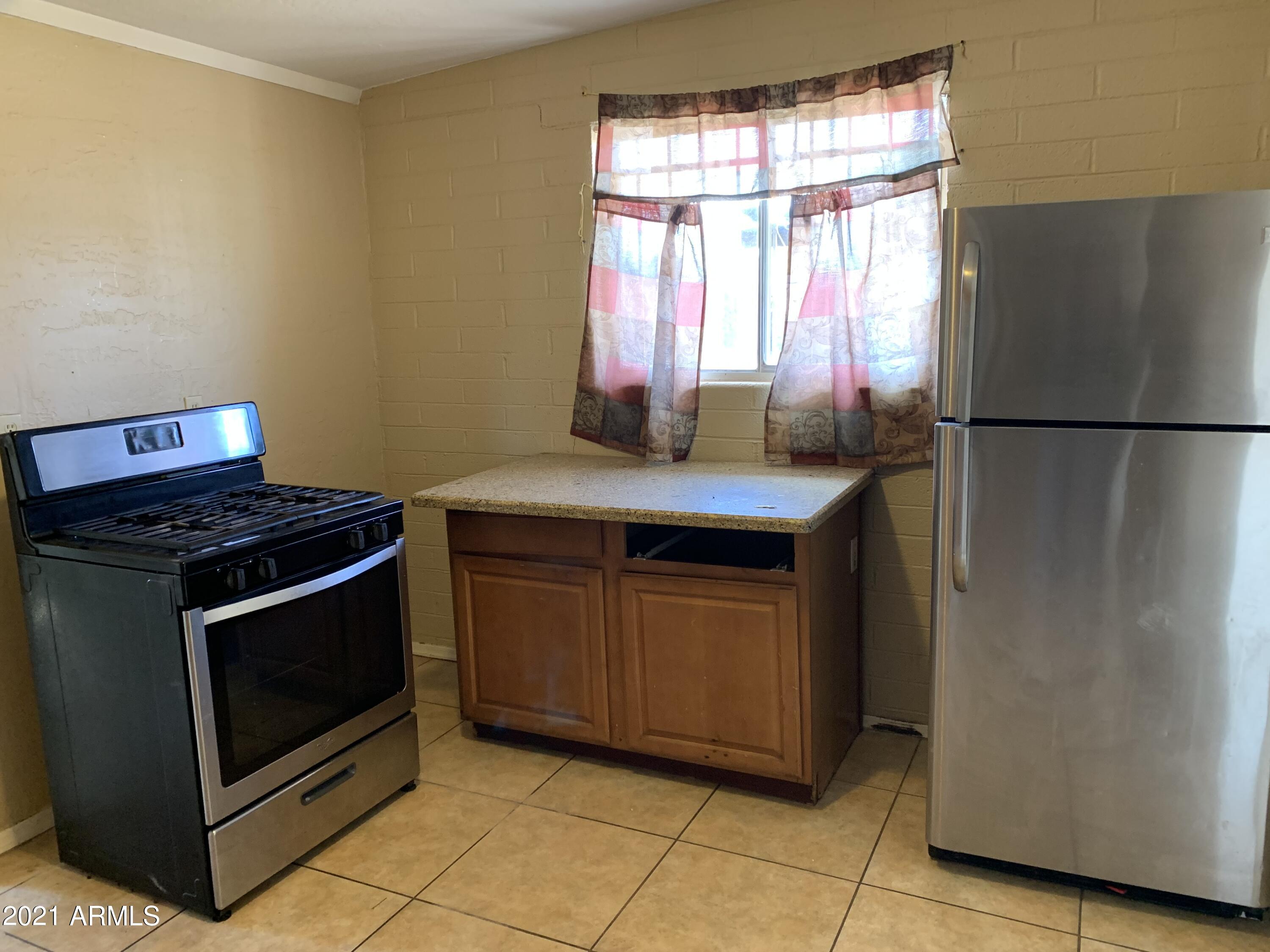 3758 West Romley Road Phoenix, AZ 85041 - Photo 8 of 13 IMG-3507