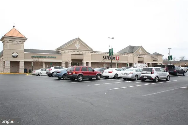 a view of a cars parked in front of a house