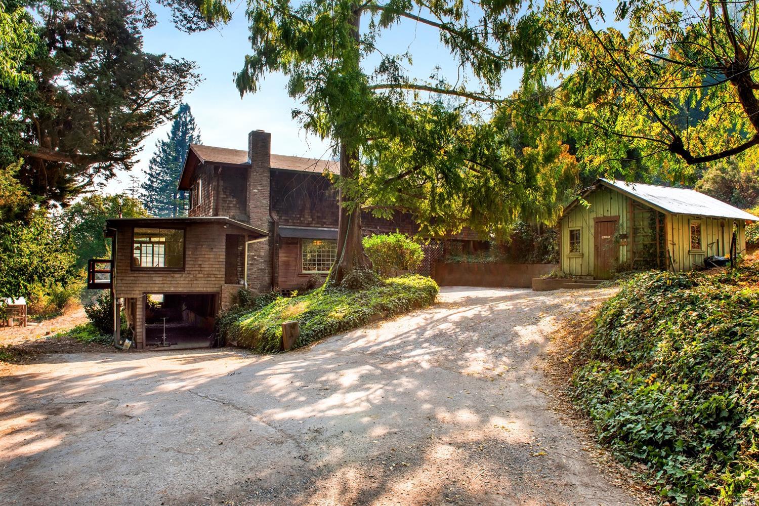 630 Montgomery Road Sebastopol, CA 95472 - Photo 1 of 1 a front view of a house with a yard and garage