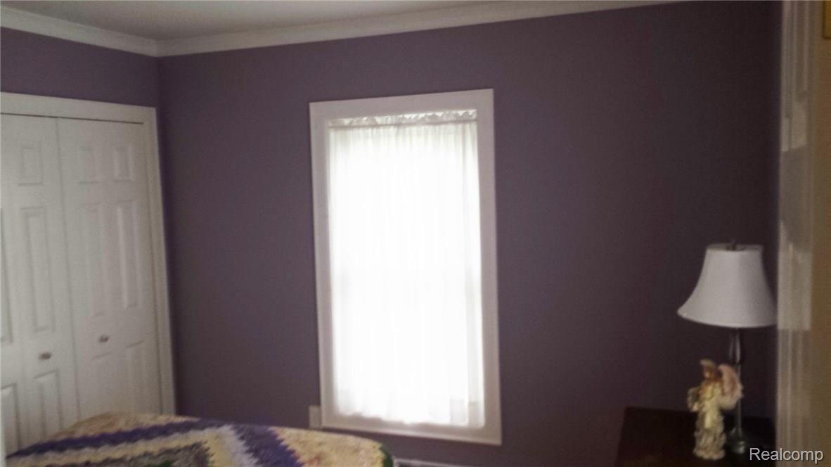 9772 Bryce Road Avoca, MI 48006 - Photo 8 of 26 This is a view of bedroom 3.