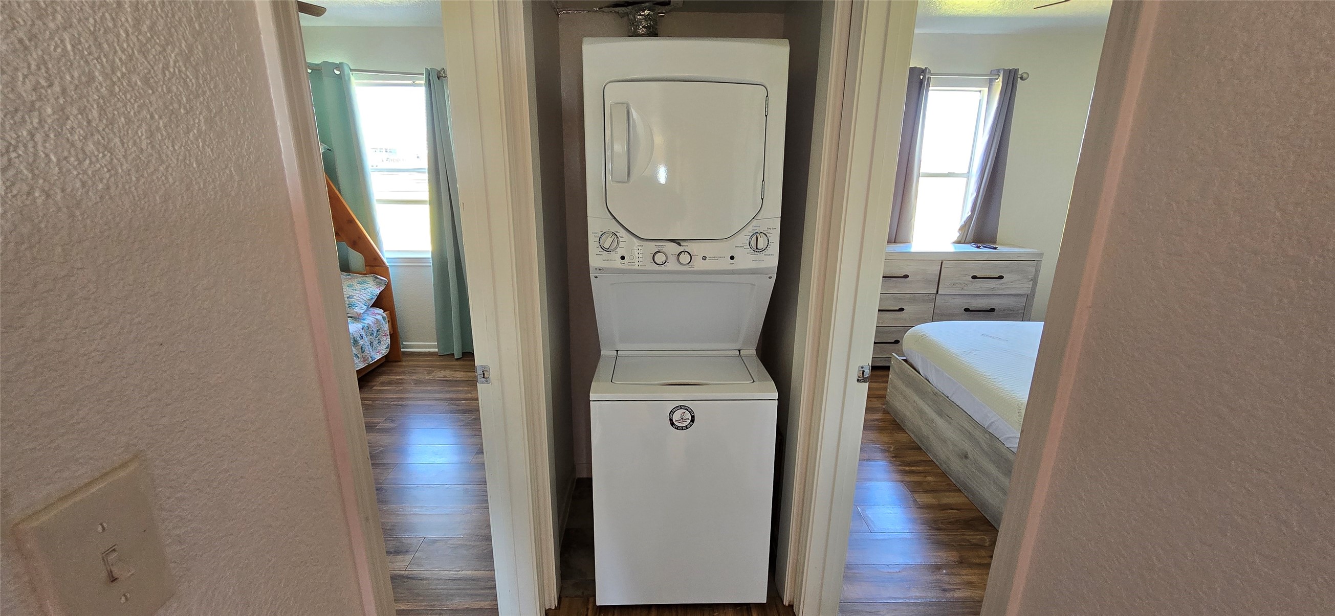 16506 Blackbeard Road, Unit E Jamaica Beach, TX 77554 - Photo 8 of 10 wooden floor in a gallery