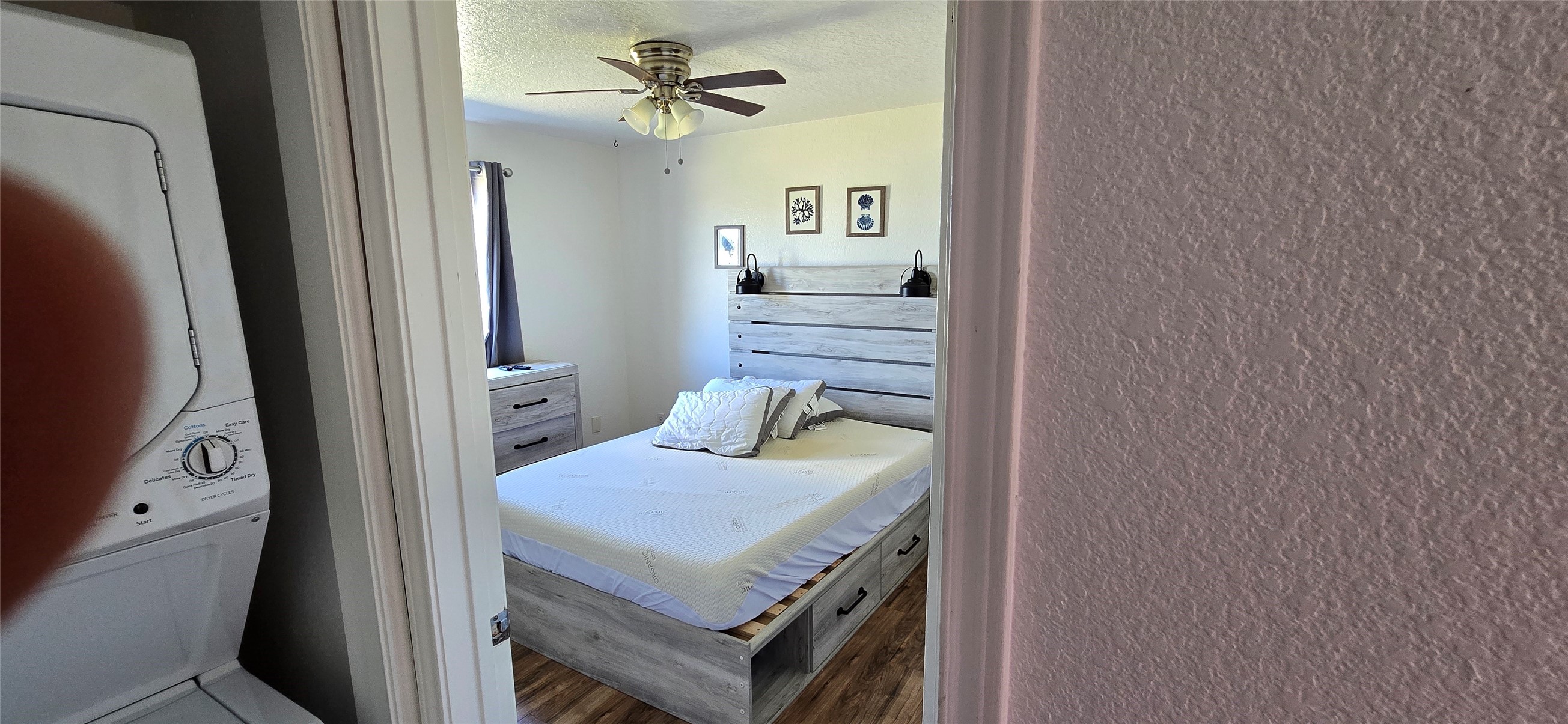 16506 Blackbeard Road, Unit E Jamaica Beach, TX 77554 - Photo 9 of 10 a view of a kitchen from the hallway