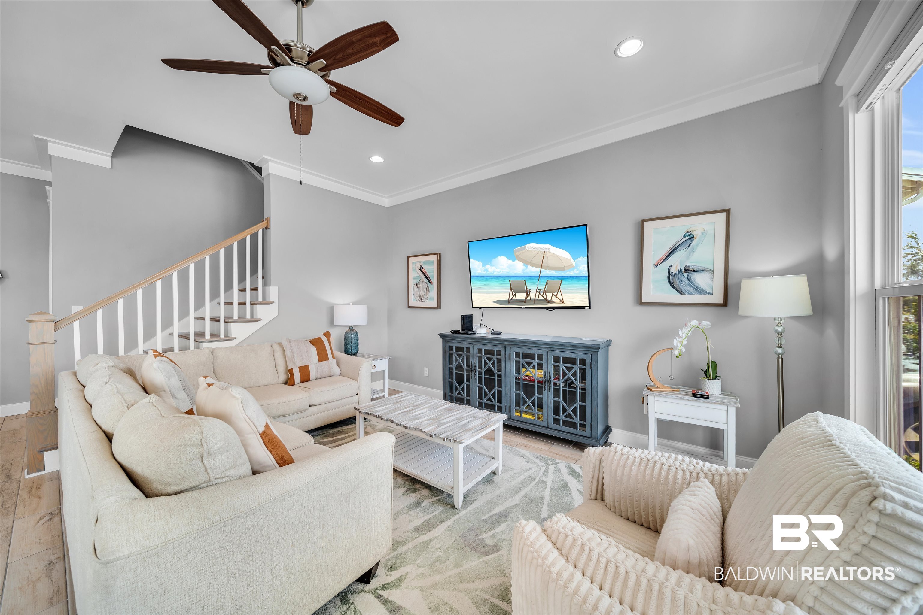 47 Parks Edge Orange Beach, AL 36561 - Photo 2 of 40 Living room featuring ornamental molding, ceiling fan, wood finished floors, stairs, and recessed lighting