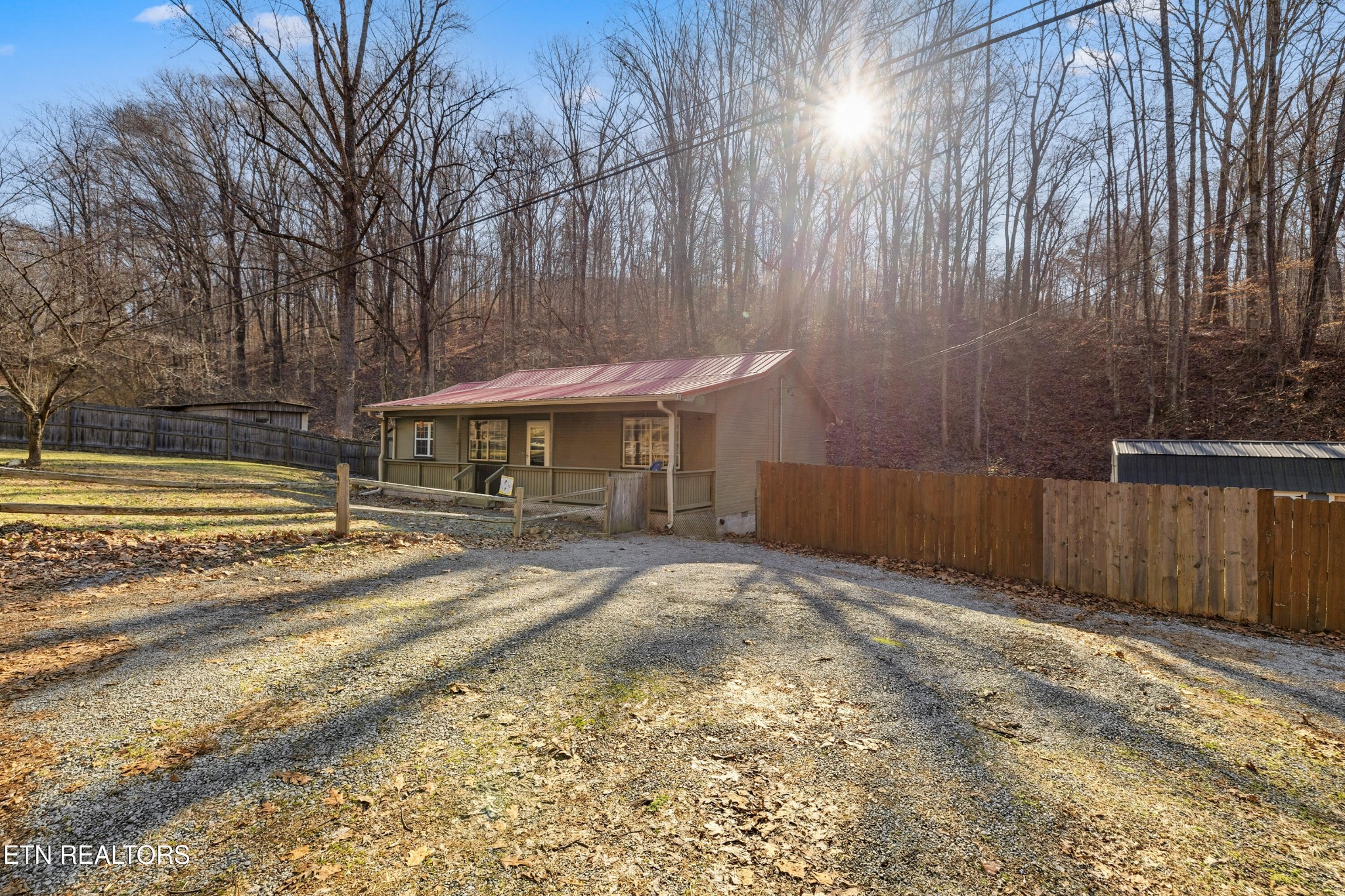 3214 Long Hollow Road Powell, TN 37849 - Photo 3 of 23 a view of a house with a yard and tree s
