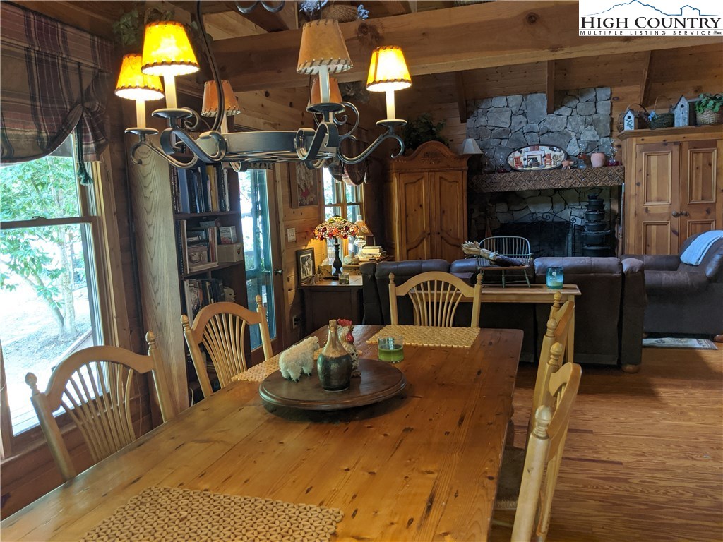 2462 Elk Ridge Road Ferguson, NC 28624 - Photo 8 of 41 a view of a dining room with furniture window and outside view