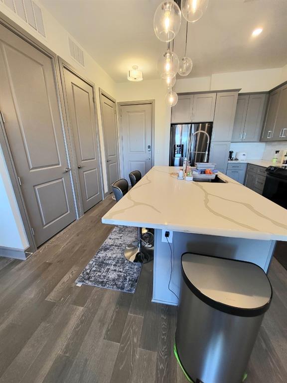 2700 Old Denton Road, Unit 3314 Carrollton, TX 75007 - Photo 12 of 18 a bed room with a bed and a mirror