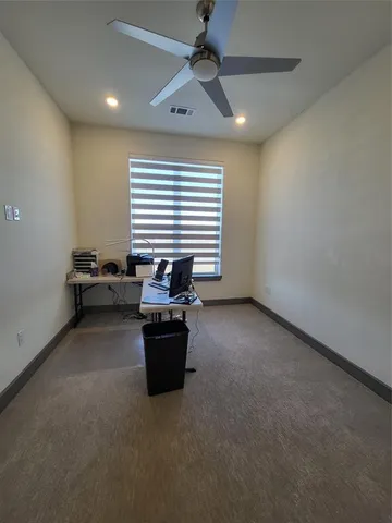 a room with furniture and window