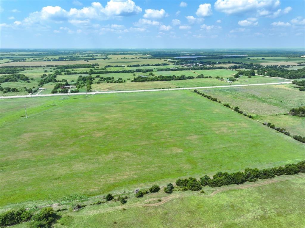 3486 FM 3486, Unit 2 Terrell, TX 75160 - Photo 11 of 14 a view of an ocean and a yard