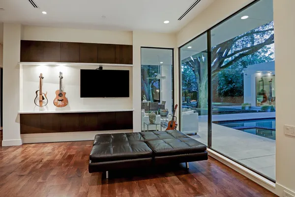 a living room with a couch and a flat screen tv
