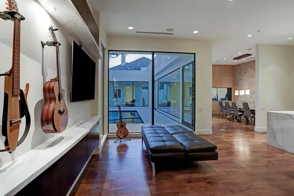 a living room with furniture and a large window