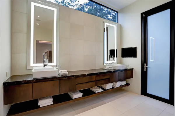 a bathroom with a mirror