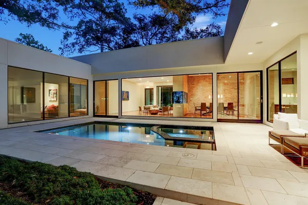 a view of a swimming pool with an outdoor space
