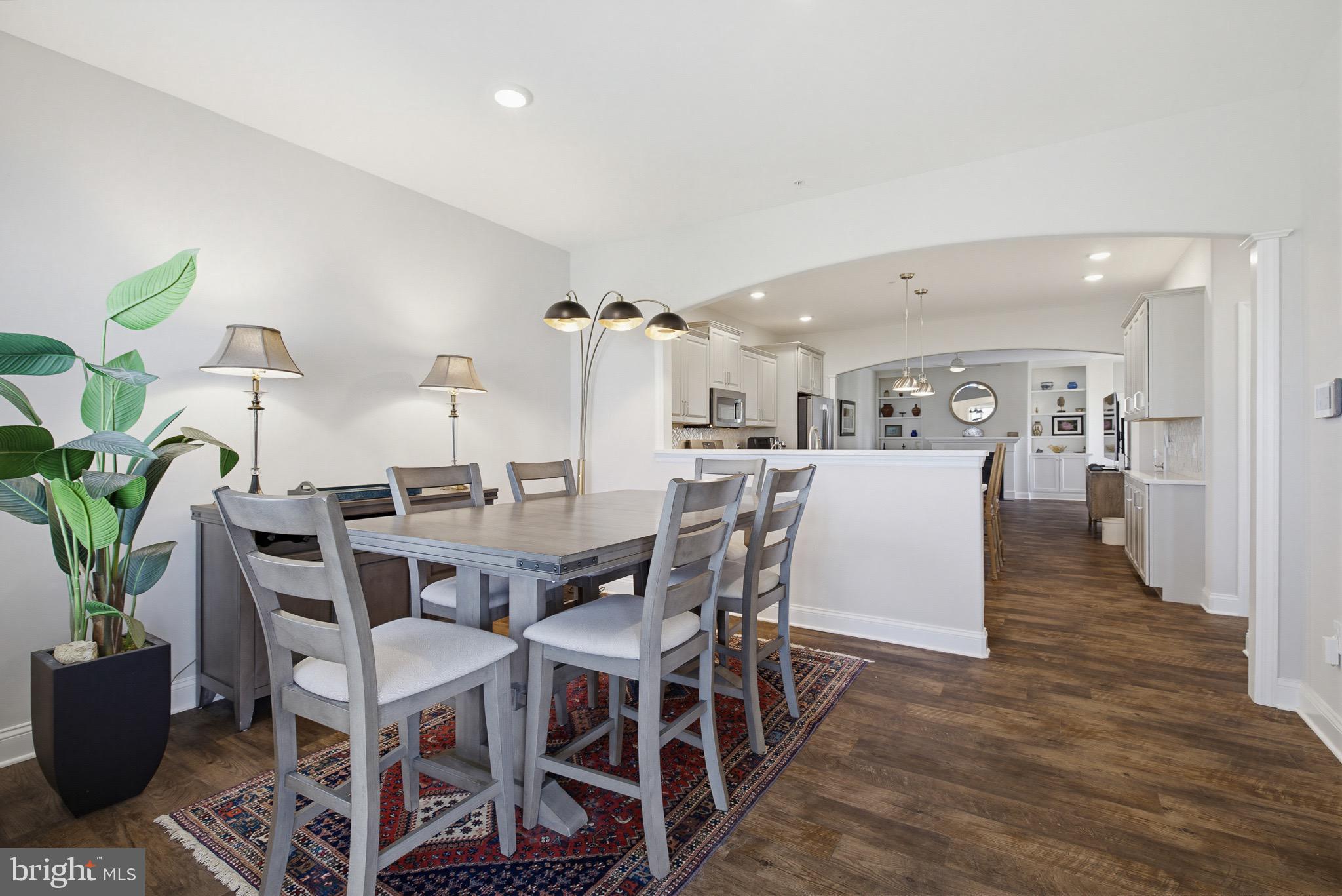 361 Meadow Rose Drive Lititz, PA 17543 - Photo 15 of 39 a view of a dining room with furniture and wooden floor