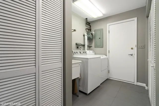 a bathroom with a sink a mirror and a shower