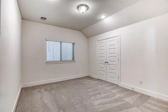 a bathroom with a sink toilet a mirror and shower
