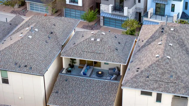 a front view of a house with a garage