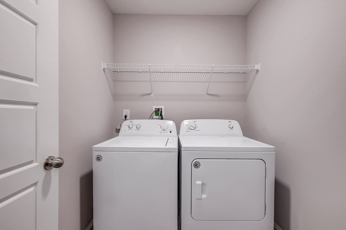 414 Andean Court Clarksville, TN 37040 - Photo 11 of 26 a utility room with dryer and washer