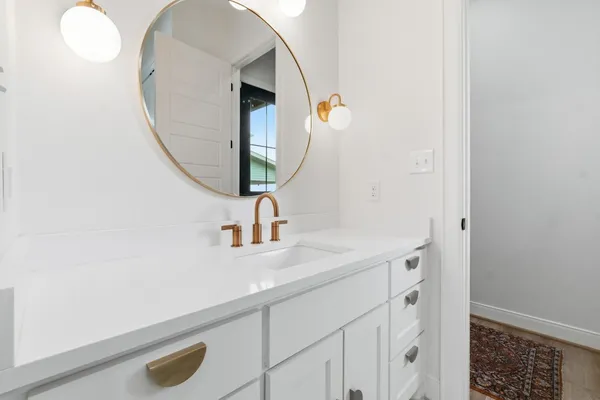 an aerial view of a house with a big yard