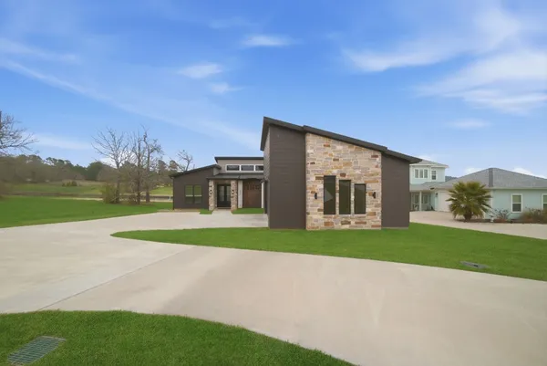 a view of a kitchen from the hallway