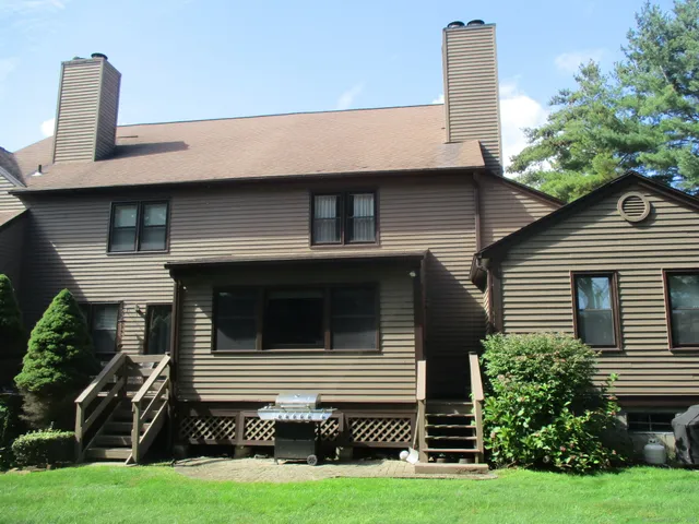 a house that has a tree in the house