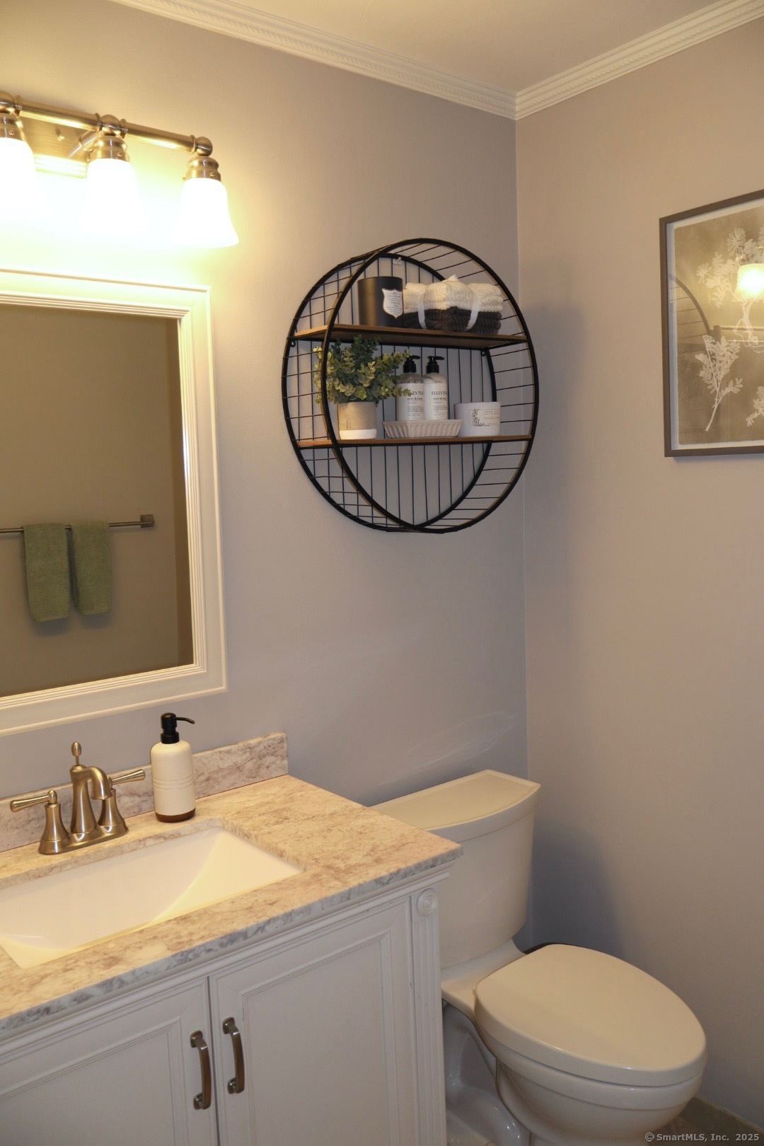 33 Stillmeadow Circle, Unit 33 Monroe, CT 06468 - Photo 5 of 14 a bathroom with a sink and a mirror