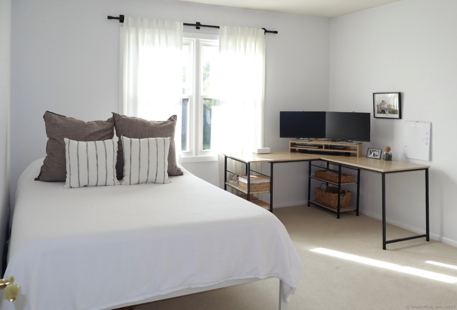 33 Stillmeadow Circle, Unit 33 Monroe, CT 06468 - Photo 8 of 14 a bedroom with a bed and a flat screen tv