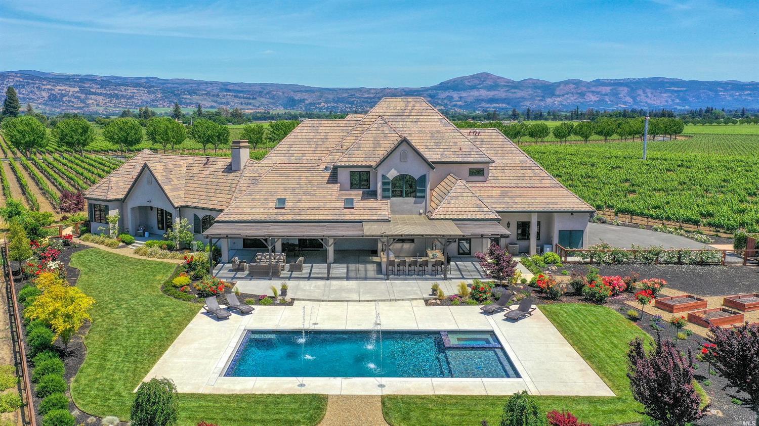 45 Hunter Ranch Road Napa, CA 94558 - Photo 1 of 1 an aerial view of a house with swimming pool garden and patio