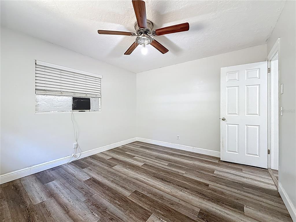 1614 Braund Avenue Clearwater, FL 33756 - Photo 15 of 29 a view of a room with a ceiling fan