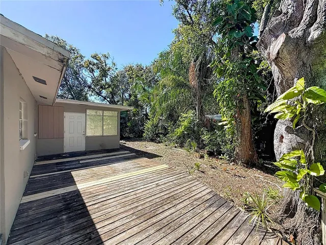 a view of a couches in backyard of the house