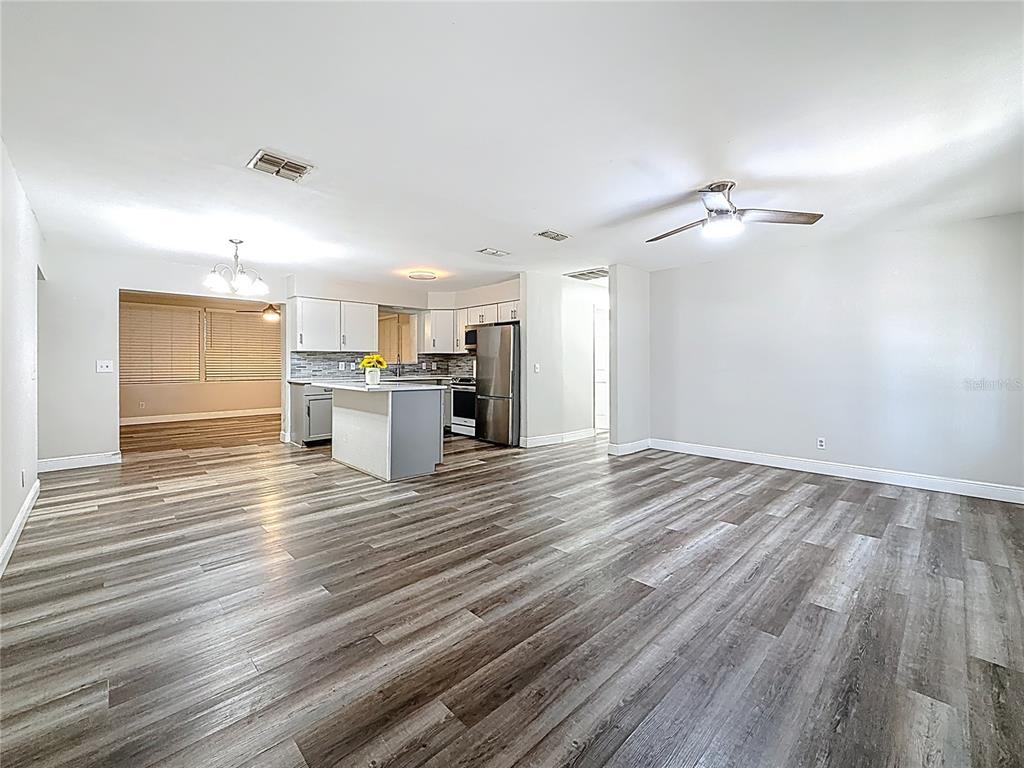 1614 Braund Avenue Clearwater, FL 33756 - Photo 3 of 29 a view of empty room with wooden floor