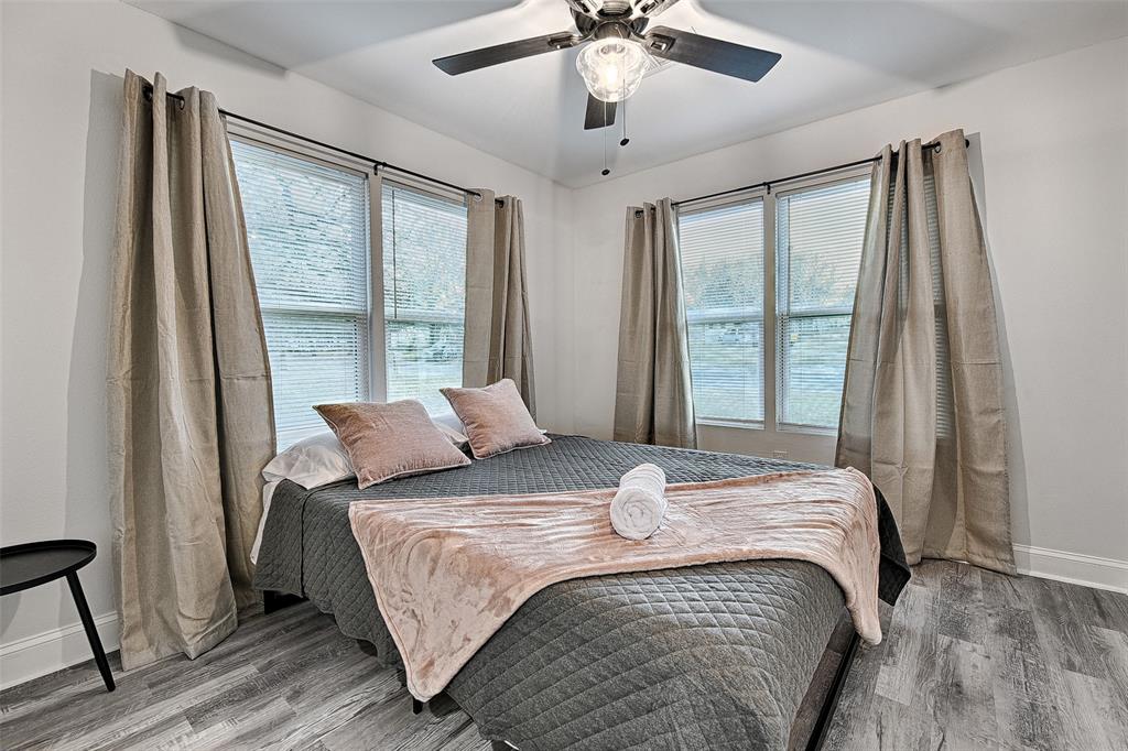 1201 Ridgewood Road Denison, TX 75020 - Photo 16 of 29 Bedroom with hardwood / wood-style floors and ceiling fan