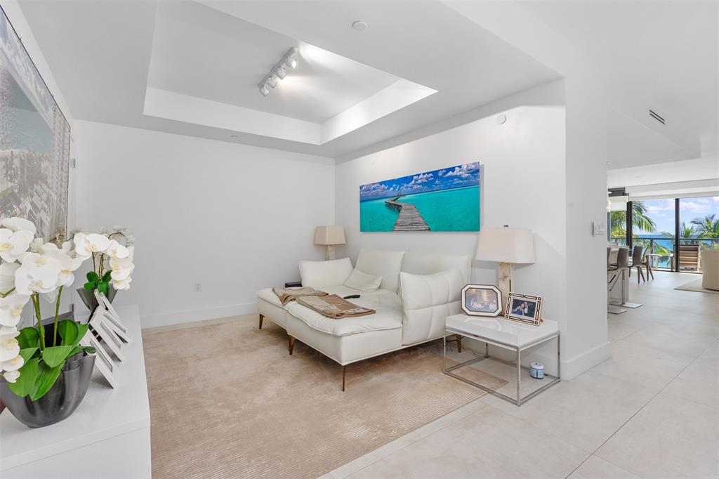 2101 South Surf Road, Unit 4C Hollywood, FL 33019 - Photo 40 of 55 a living room with furniture and flowers