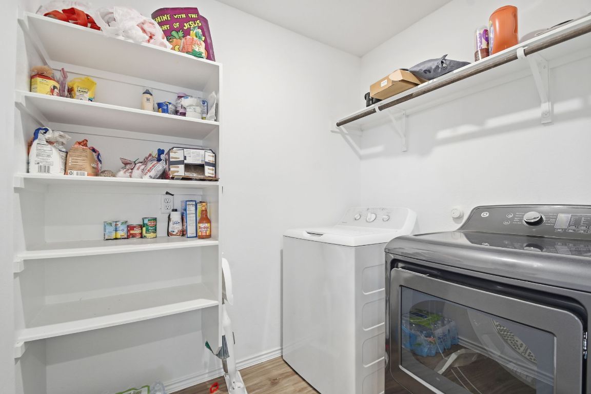 287 George Neggan Lane Bastrop, TX 78602 - Photo 16 of 26 a utility room with dryer and washer