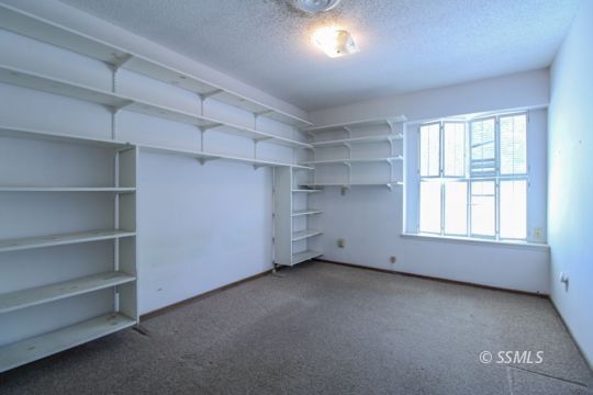 537 South Fairview Street Ridgecrest, CA 93555 - Photo 20 of 35 a view of an empty room with a window