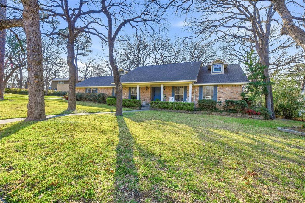 118 Ridgecrest Circle Denton, TX 76205 - Photo 1 of 1 front view of a building with a yard