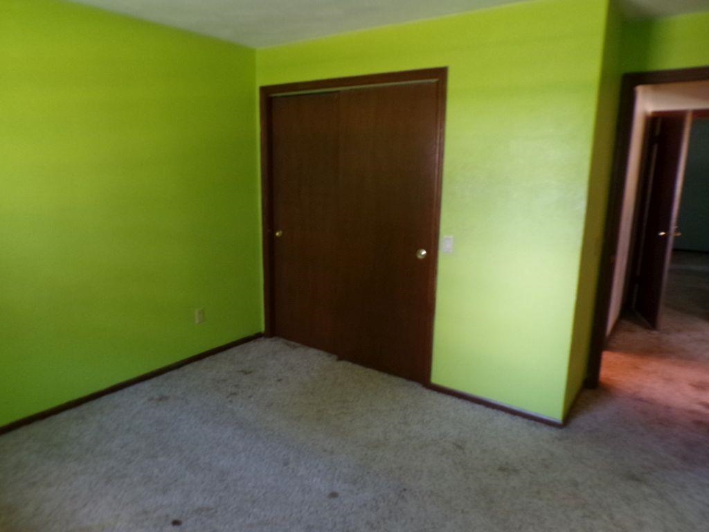 5779 Town Line Road Leaf River, IL 61047 - Photo 11 of 14 an empty room with closet